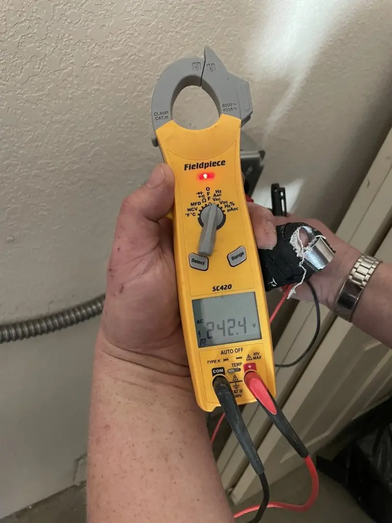 Voltage testing with clamp meter during Generator Installation in Foster City